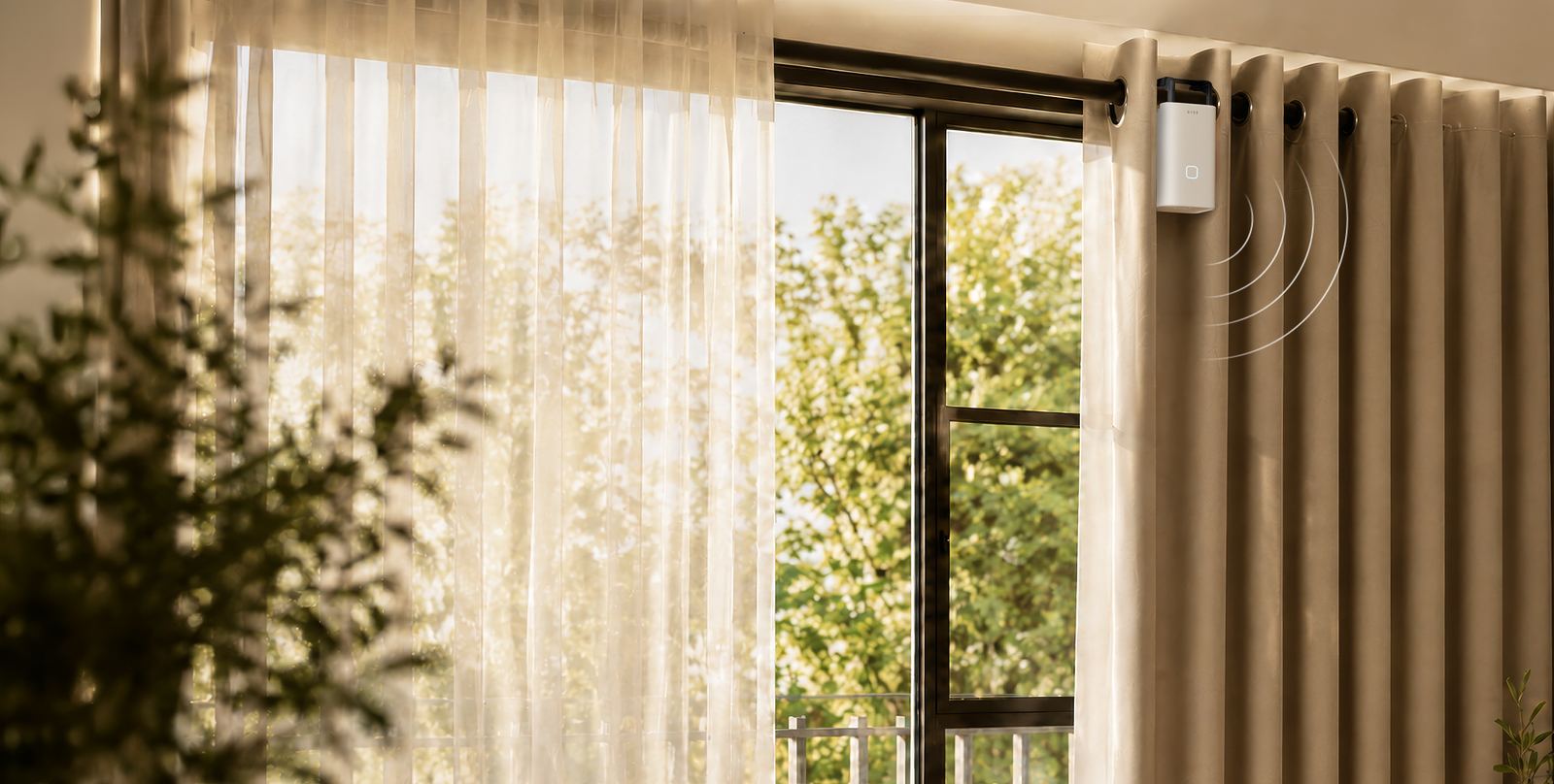 A RYSE SmartCurtain motor hanging on a curtain rod
