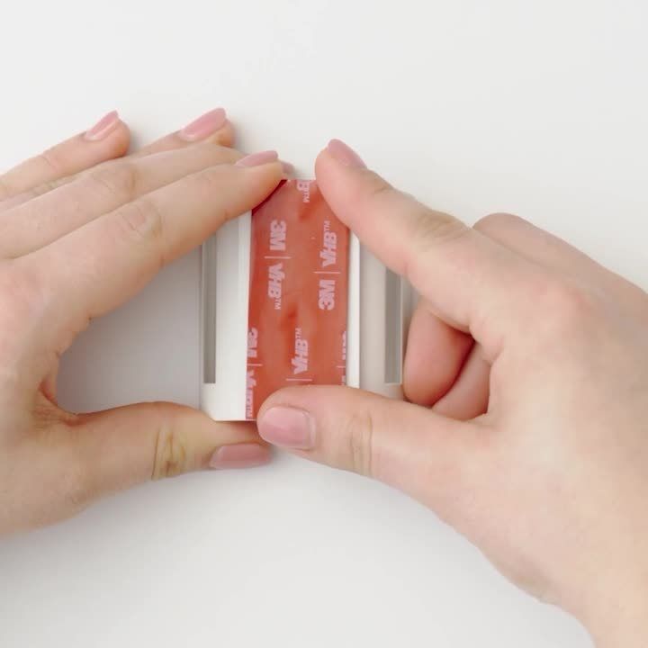 Tape on the back of the bracket